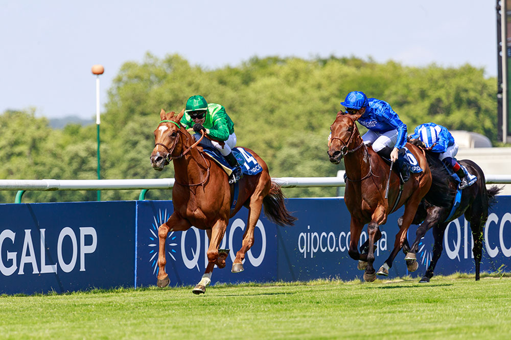 Sottsass (green) powers past Persian King to win the Group 1 Prix du Jockey Club field in a new course record time.